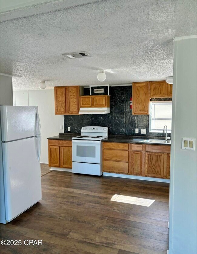 Foto del edificio - 6801 Adams Rd