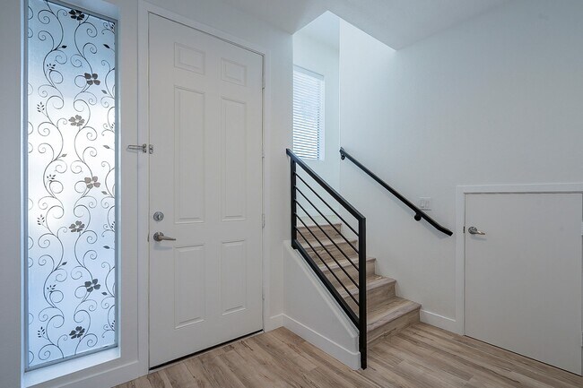 Front door entry way with storage - 6605 N 93rd Ave