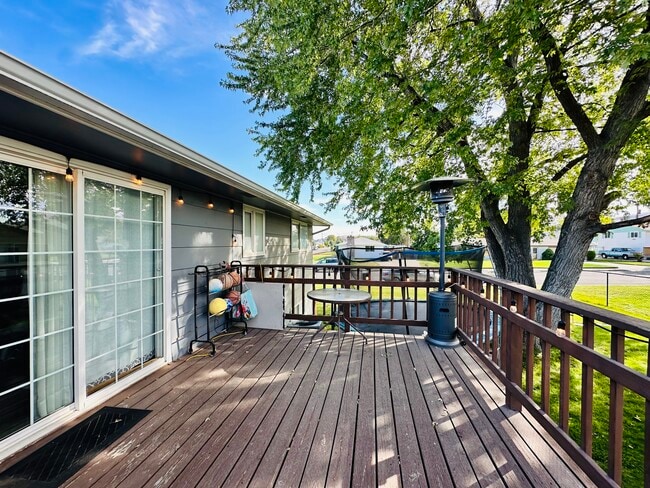 Back patio to back yard from kitchen sliding door - 219 Thayer Dr