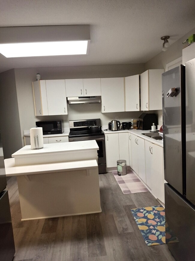 Photo du bâtiment - Grand 2 chambres + 1 stationnement inclus - Rue de la Futaie, Gatineau