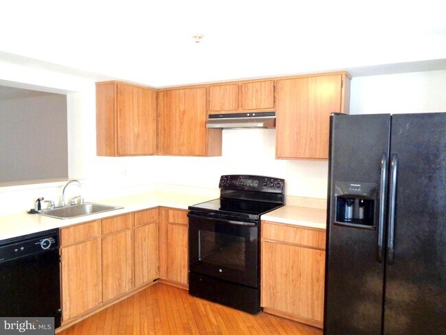 Building Photo - 15334 Norwalk Ct