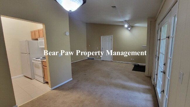 Building Photo - "Charming 2-Bed Condo with Cozy Fireplace in Scenic Evergreen!"