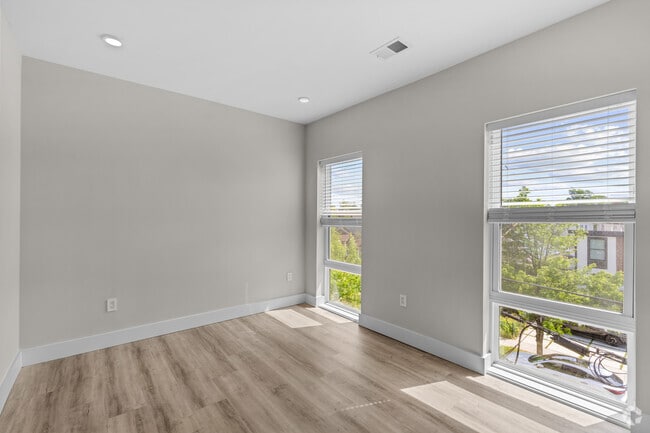 2BR, 2BA - 770SF - Primary Bedroom - Evergreen Apartments