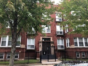Building Photo - 6137 S Vernon Ave
