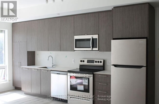 Building Photo - 871-871 Sheppard Ave W