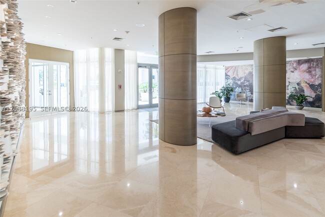 Building Photo - 10275 Collins Ave
