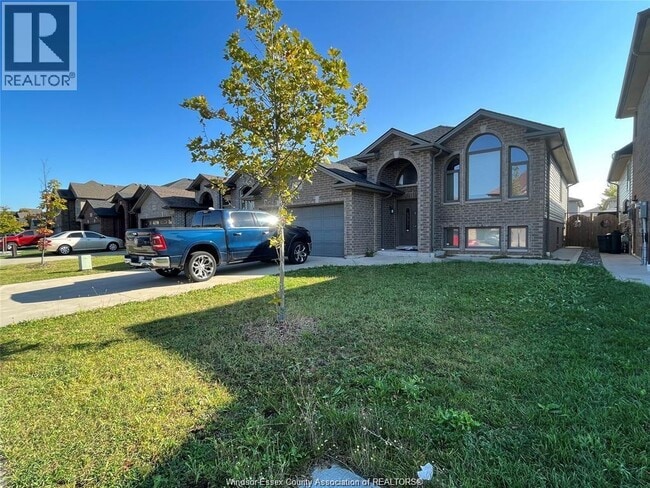 Building Photo - 4832 Periwinkle Crescent