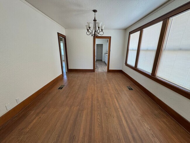 Building Photo - Beautiful hardwood floors throughout!