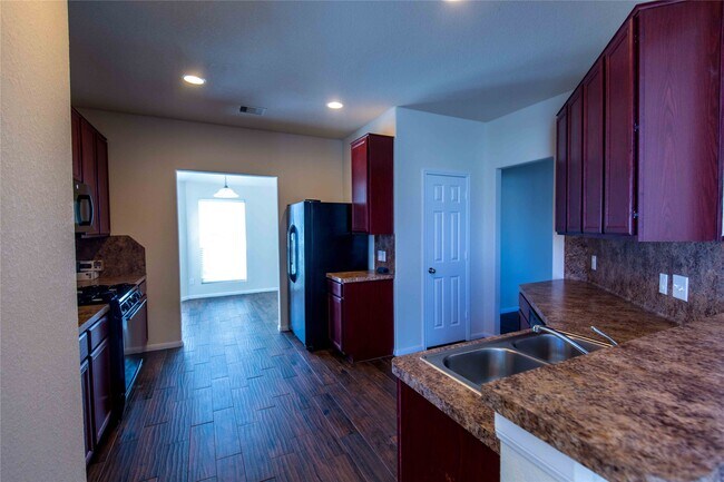 Foto del edificio - 15010 Rustler Gate Ln