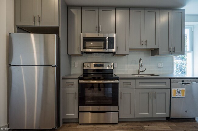 Foto del edificio - 3 br, 2 bath 4plex - 3213 HAVERFORD AVE Un...