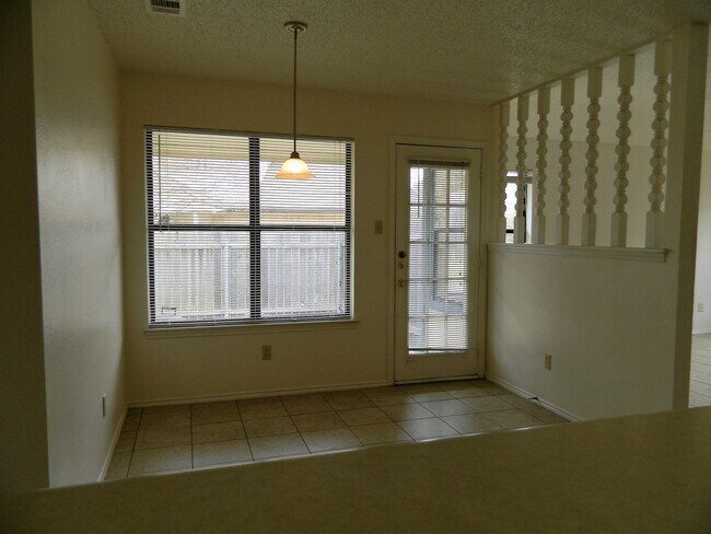 Picture from inside kitchen towards back patio - 7806-A Chimayo Cv.