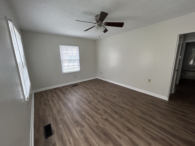 Beautiful living room with ceiling fan - 204 Hamlin Ave