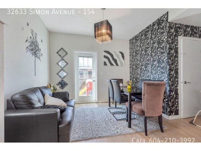 Building Photo - Corner Unit Townhouse In Abbotsford!