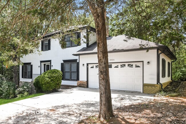 Building Photo - Lovely 4 Bedroom