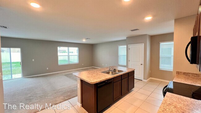 Building Photo - 4 br, 2.5 bath House - 10215 Mangrove Well Rd