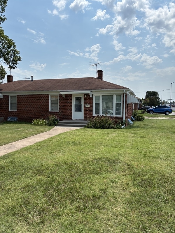 Building Photo - 1 E 28th Ave