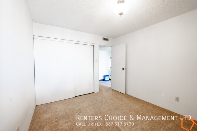 Photo du bâtiment - Downtown Condo Complex with Gym, Elevator & Parkade