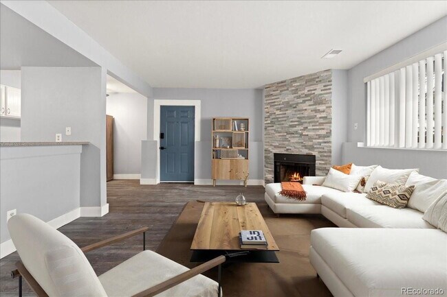 Building Photo - "Charming 2-Bed Condo with Cozy Fireplace in Prime Arvada Location!"