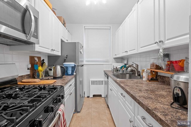 Building Photo - 2160 Center Avenue, Unit 1-P