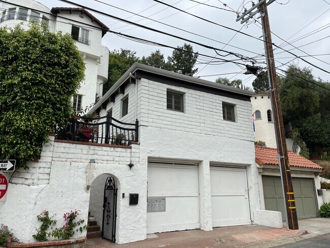 Unit is above garage, which is used for storage, not parking - 2297 Holly Dr