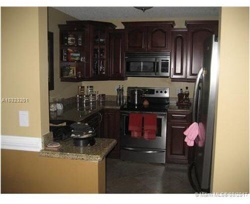 Building Photo - 3299 Cocoplum Cir