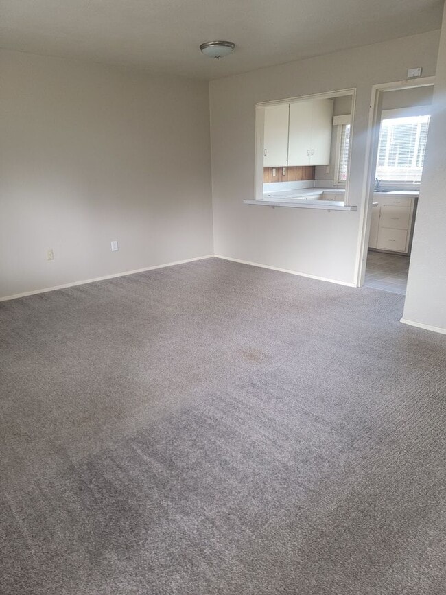 Building Photo - Cozy Parkland 2 bedroom house with Fenced Yard