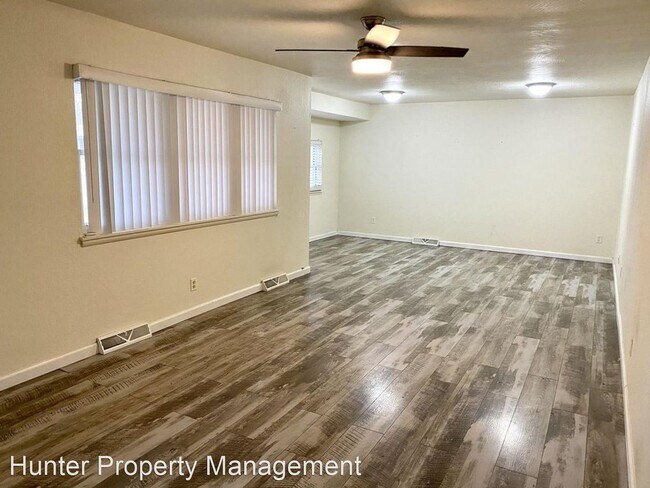Building Photo - 4 br, 2 bath House - 2400 S Nettleton Ave
