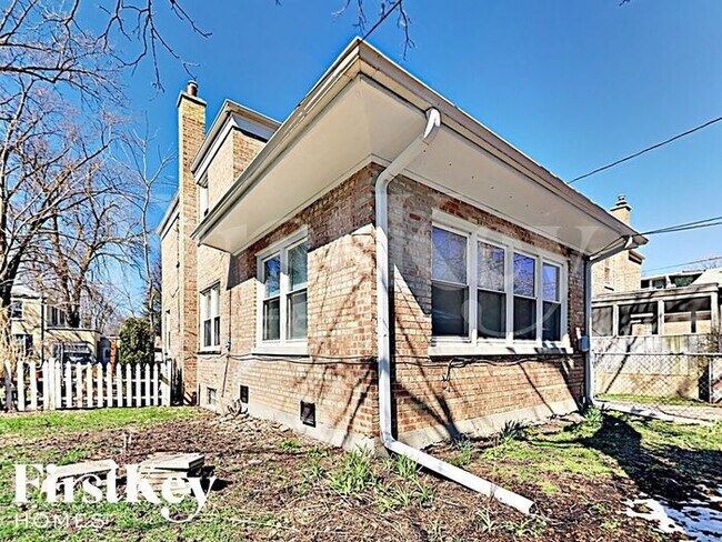 Building Photo - 1573 West 100th Place