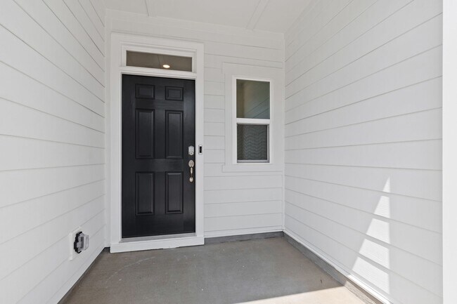 Foto del edificio - Modern 3-Bedroom Townhome Near Downtown Du...