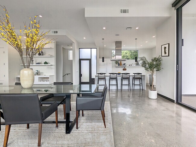 Dining area within open concept layout that feels grand and spacious - 1136 18th St