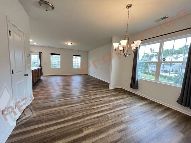 Building Photo - Beautiful End-Unit Townhome with Loft & 2-Car Garage in Trivium at Brier Creek , Morrisville – Av...