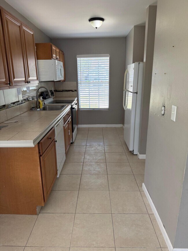 Foto del edificio - 1456 SE Rivergreen Cir