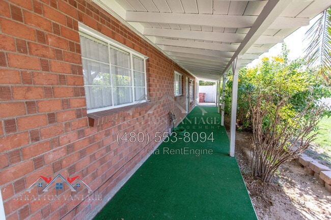 Building Photo - 8119 E Amelia Ave