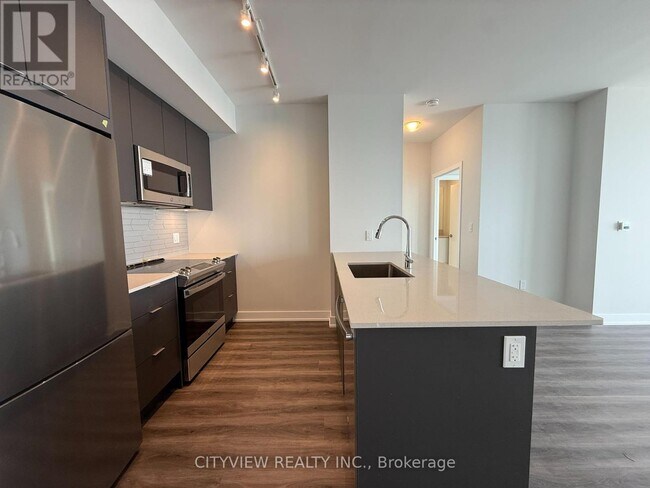 Photo du bâtiment - 430-4430 Square One Dr