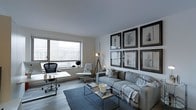 This single-floor space offers a thoughtfully designed interior that blends functionality with modern aesthetics. The main living area is bright and airy, anchored by a large window that fills the room with natural light and offers views of the surrounding urban landscape. Light-toned hardwood flooring runs throughout, complementing the clean white walls and smooth ceilings that contribute to a sense of openness.

The living area is furnished with a comfortable gray sofa accented by decorative throw pillows and a cozy blanket, centered around a sleek metal-framed coffee table atop a textured navy blue area rug. A grid of six framed architectural prints serves as a striking focal point on one wall, adding a curated, artistic touch to the space.

A dedicated workspace is thoughtfully integrated into the layout, featuring a clean white desk, an ergonomic office chair, and a modern tripod floor lamp, making it well-suited for productivity without compromising the overall aesthetic. A second accent chair provides additional seating, enhancing the room's versatility.

The overall ambiance is calm and contemporary, with a neutral color palette punctuated by subtle accents of navy and warm wood tones. This space is well-suited for both relaxed living and focused work.