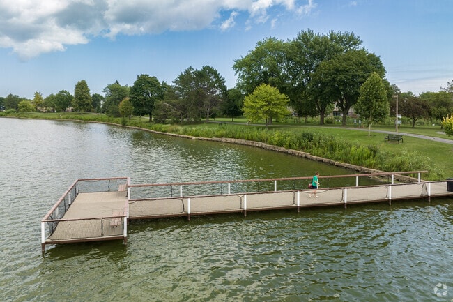 A resident of Vernon Hills spends time on the fishing pier at Century Park.