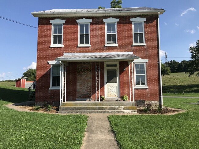 Street view of house, the entrance for this unit os on the left side - 1353 Irish Creek Rd