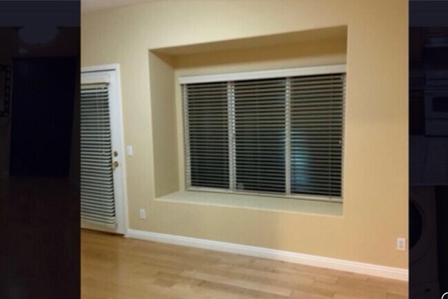 Bedroom with window seating area - 1126 W Duarte Rd
