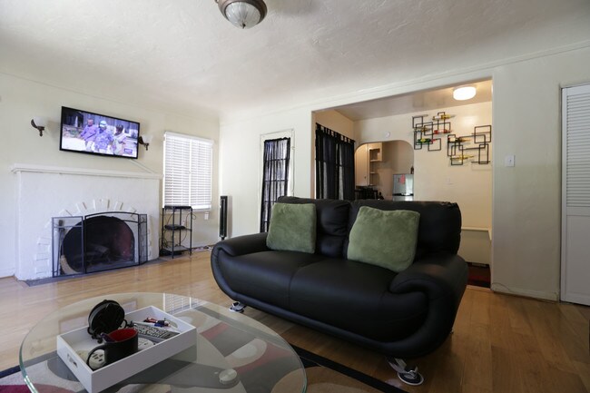Living room & fireplace - 506 N Sweetzer Ave