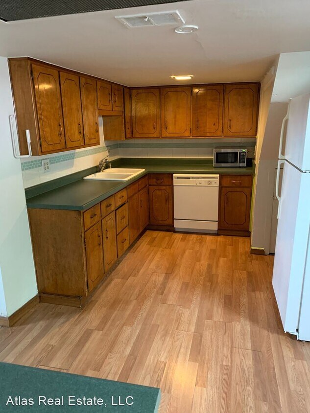 Foto principal - 1201-1211 E 62nd Ave