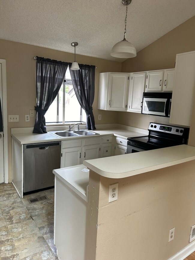 Updated kitchen - 9627 W Chatfield Ave