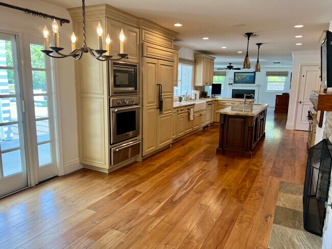 Open kitchen with Wolf and Thermador appliances - 4703 Ferncreek Dr