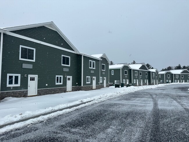 Image showcasing Eden Apartments with EV Charging