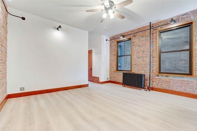 Building Photo - 67-07 Woodside Ave