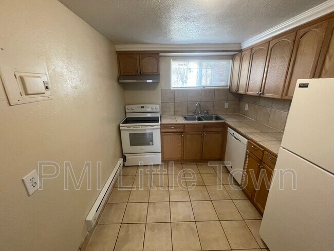 Building Photo - 4456 E 68th Ave