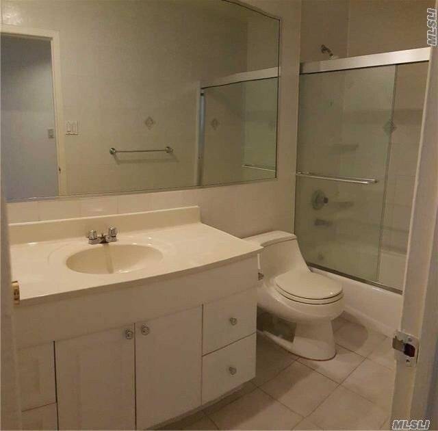 Building Photo - 214-05 16th Ave