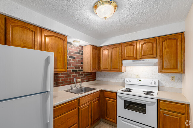 1BR, 1BA With Fireplace - Kitchen - Meadowbrook Apartments