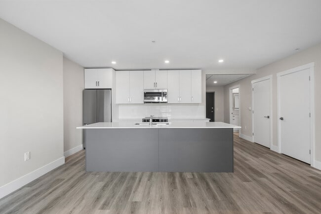 Building Photo - 1 Bedroom + Den Elation Suites - Plan C