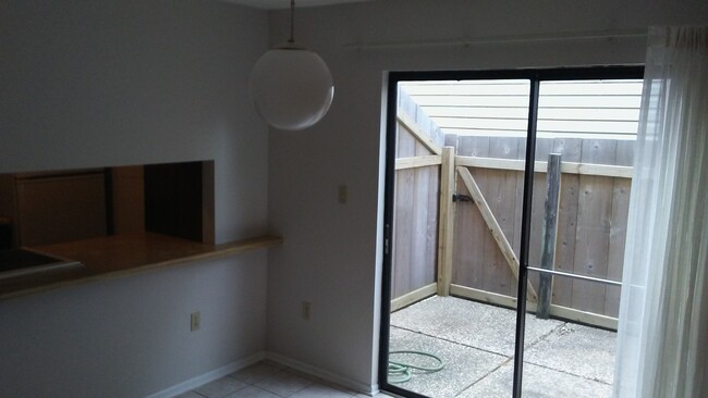 Dining room and private patio - 110 W Bayou Pky