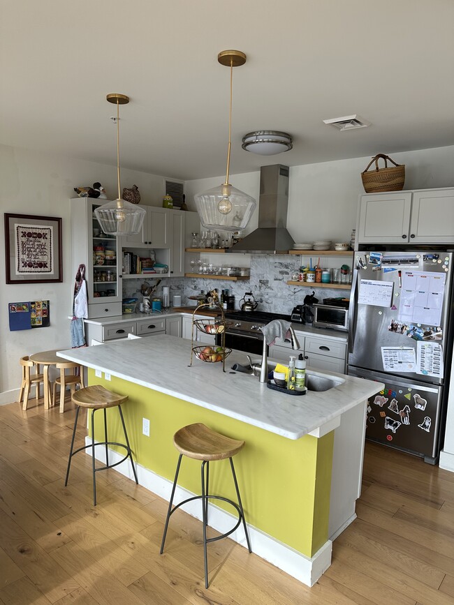 Kitchen w/ Italian marble island and counters - 60 Winooski Falls Way